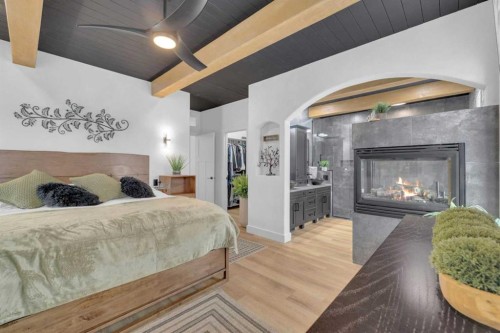 30 Law Close, Red Deer, AB - Indoor Photo Showing Bedroom With Fireplace