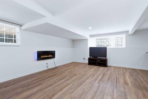 50 Greenham Drive, Red Deer, AB - Indoor With Fireplace