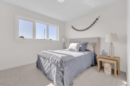 107 Hampton Crescent, Sylvan Lake, AB - Indoor Photo Showing Bedroom