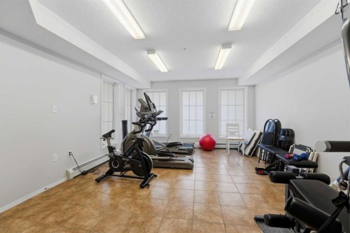 112-3 Broadway Rise, Sylvan Lake, AB - Indoor Photo Showing Gym Room