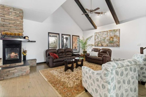 7 Laurel Road, Sylvan Lake, AB - Indoor Photo Showing Living Room With Fireplace