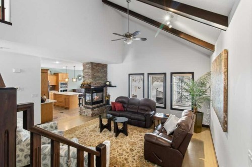 7 Laurel Road, Sylvan Lake, AB - Indoor Photo Showing Living Room With Fireplace