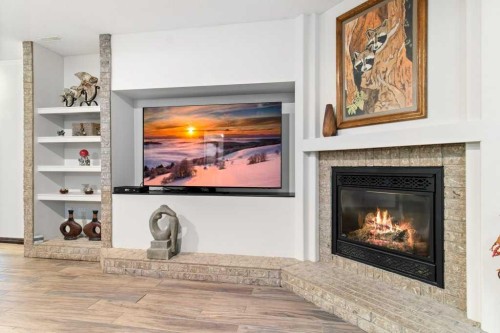 7 Laurel Road, Sylvan Lake, AB - Indoor With Fireplace