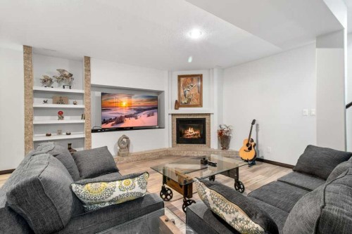 7 Laurel Road, Sylvan Lake, AB - Indoor Photo Showing Living Room With Fireplace