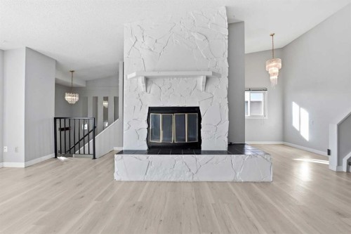 46 Duncan Crescent, Red Deer, AB - Indoor Photo Showing Living Room With Fireplace