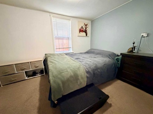 130 2 Avenue, Leslieville, AB - Indoor Photo Showing Bedroom