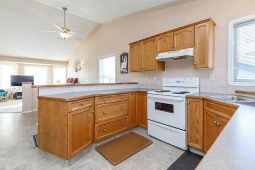12 Dentoom, Red Deer, AB - Indoor Photo Showing Kitchen With Double Sink