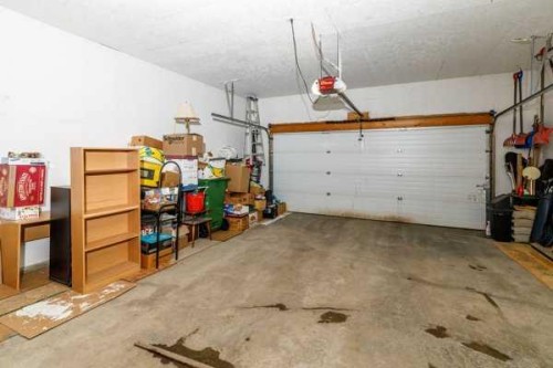 12 Dentoom, Red Deer, AB - Indoor Photo Showing Garage