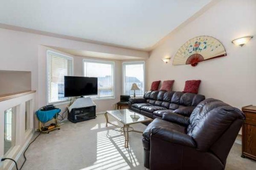 12 Dentoom, Red Deer, AB - Indoor Photo Showing Living Room With Fireplace