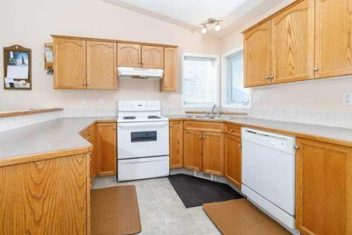 12 Dentoom, Red Deer, AB - Indoor Photo Showing Kitchen With Double Sink