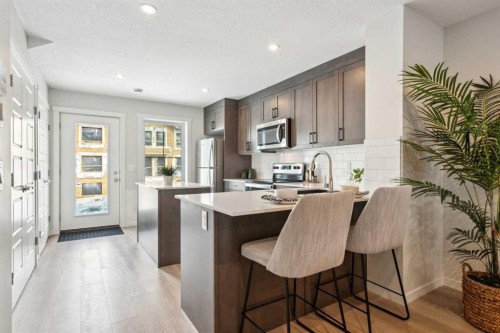 14685 1 Street Ne, Calgary, AB - Indoor Photo Showing Kitchen With Upgraded Kitchen