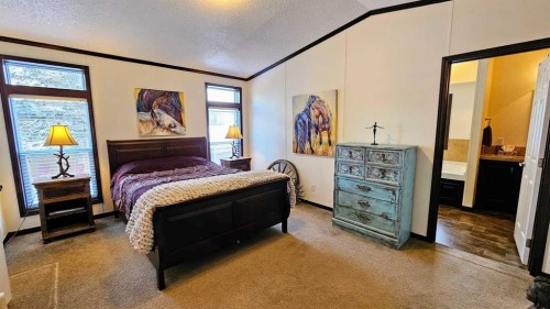 205 4 Street Nw, Sundre, AB - Indoor Photo Showing Bedroom