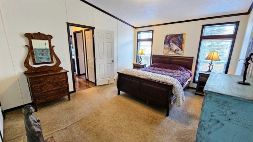 205 4 Street Nw, Sundre, AB - Indoor Photo Showing Bedroom