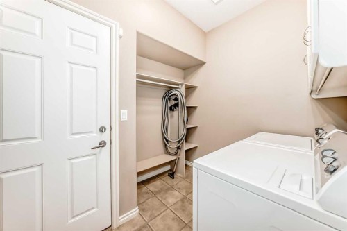 8 Filbert Close, Sylvan Lake, AB - Indoor Photo Showing Laundry Room