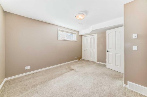 8 Filbert Close, Sylvan Lake, AB - Indoor Photo Showing Bedroom