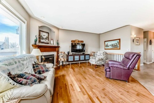 8 Filbert Close, Sylvan Lake, AB - Indoor Photo Showing Living Room With Fireplace