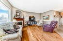 8 Filbert Close, Sylvan Lake, AB  - Indoor Photo Showing Living Room With Fireplace 