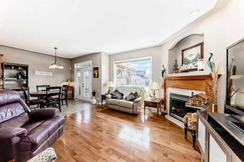 8 Filbert Close, Sylvan Lake, AB - Indoor Photo Showing Living Room With Fireplace