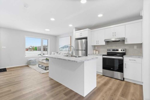 47 Louis Drive, Rural Red Deer County, AB - Indoor Photo Showing Kitchen With Upgraded Kitchen