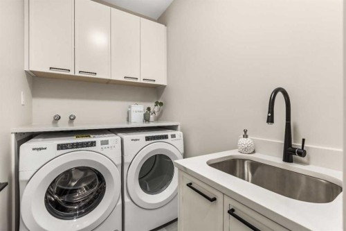 112 South Shore View, Chestermere, AB - Indoor Photo Showing Laundry Room