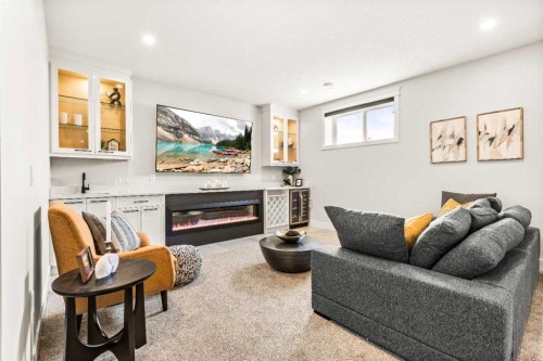 112 South Shore View, Chestermere, AB - Indoor Photo Showing Living Room With Fireplace
