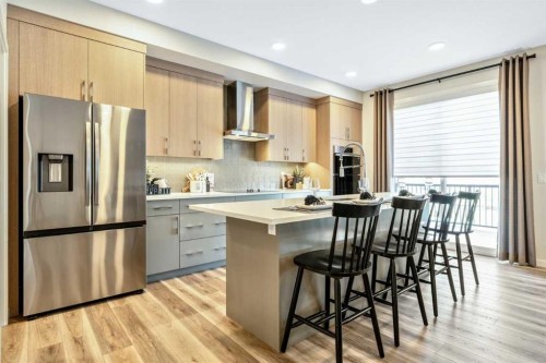 154 Osprey Hill Way Sw, Calgary, AB - Indoor Photo Showing Kitchen With Upgraded Kitchen