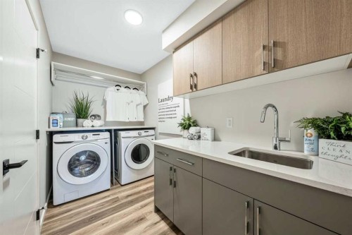 154 Osprey Hill Way Sw, Calgary, AB - Indoor Photo Showing Laundry Room