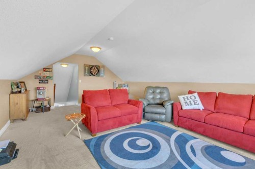 3905 39 Street Close, Ponoka, AB - Indoor Photo Showing Living Room