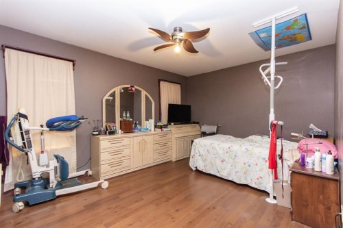 66 Stanford Boulevard, Blackfalds, AB - Indoor Photo Showing Gym Room