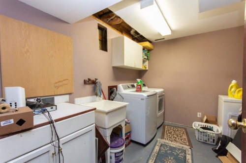 66 Stanford Boulevard, Blackfalds, AB - Indoor Photo Showing Laundry Room