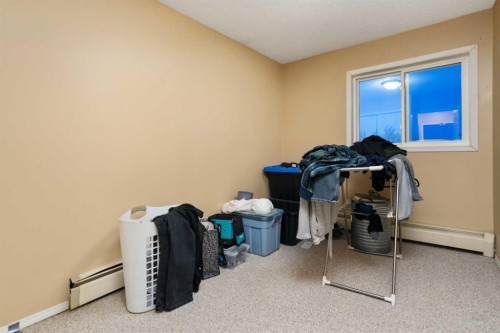 405-5418 52 Street, Camrose, AB - Indoor Photo Showing Other Room