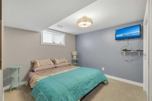 9 Pickering Close, Sylvan Lake, AB - Indoor Photo Showing Bedroom