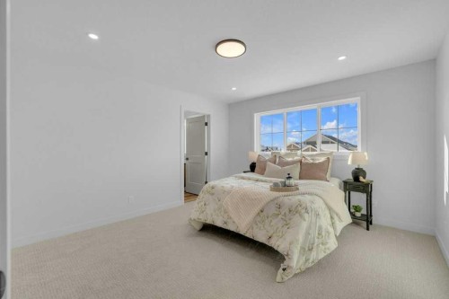 148 Red Ash Cove, Springbrook, AB - Indoor Photo Showing Bedroom