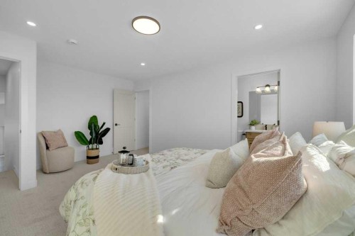 148 Red Ash Cove, Springbrook, AB - Indoor Photo Showing Bedroom