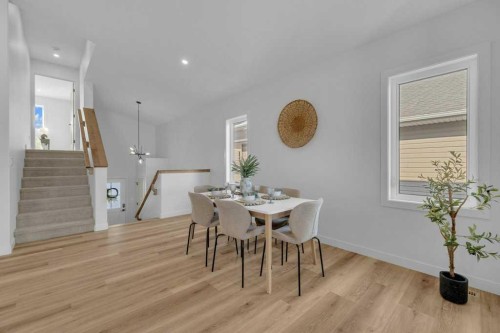 148 Red Ash Cove, Springbrook, AB - Indoor Photo Showing Dining Room