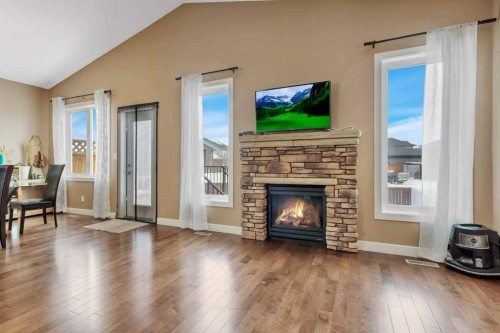 189 Van Slyke Way, Red Deer, AB - Indoor Photo Showing Living Room With Fireplace