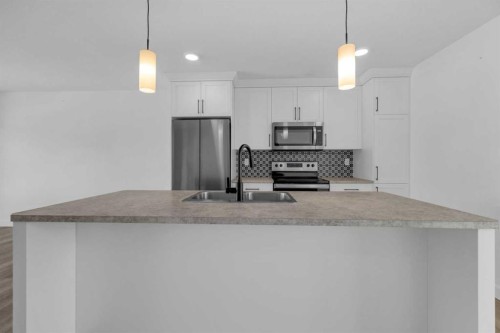 182 Ava Crescent, Blackfalds, AB - Indoor Photo Showing Kitchen With Upgraded Kitchen
