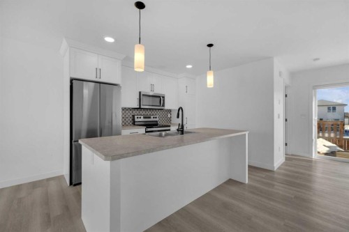 182 Ava Crescent, Blackfalds, AB - Indoor Photo Showing Kitchen With Upgraded Kitchen