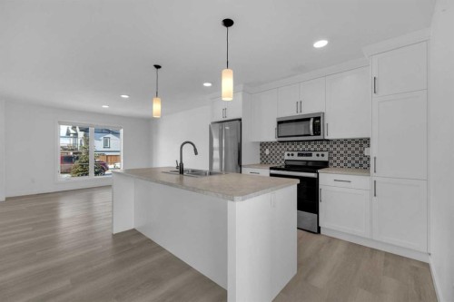 182 Ava Crescent, Blackfalds, AB - Indoor Photo Showing Kitchen With Upgraded Kitchen