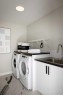 109 Belmont Path Sw, Calgary, AB  - Indoor Photo Showing Laundry Room 