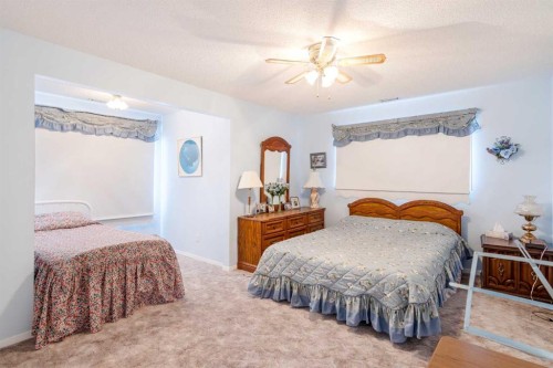 3 Rustic Road, Norglenwold, AB - Indoor Photo Showing Bedroom