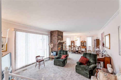 3 Rustic Road, Norglenwold, AB - Indoor Photo Showing Living Room