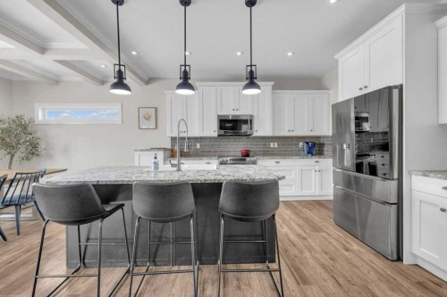 23 Bowman Circle, Sylvan Lake, AB - Indoor Photo Showing Kitchen With Upgraded Kitchen