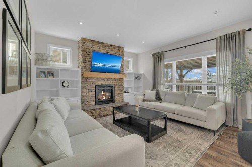 23 Bowman Circle, Sylvan Lake, AB - Indoor Photo Showing Living Room With Fireplace