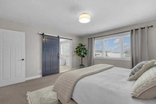 23 Bowman Circle, Sylvan Lake, AB - Indoor Photo Showing Bedroom