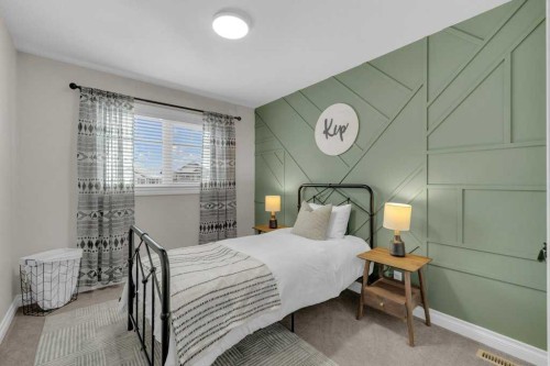 23 Bowman Circle, Sylvan Lake, AB - Indoor Photo Showing Bedroom