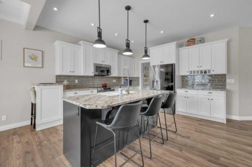 23 Bowman Circle, Sylvan Lake, AB - Indoor Photo Showing Kitchen With Upgraded Kitchen