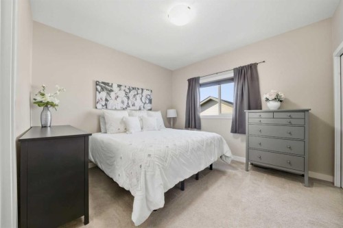 22 Mackenzie Ranch Way, Lacombe, AB - Indoor Photo Showing Bedroom