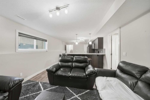 22 Mackenzie Ranch Way, Lacombe, AB - Indoor Photo Showing Living Room