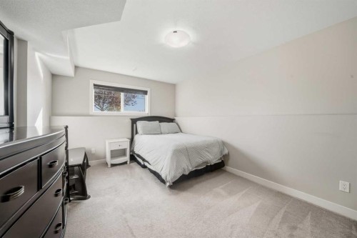 22 Mackenzie Ranch Way, Lacombe, AB - Indoor Photo Showing Bedroom
